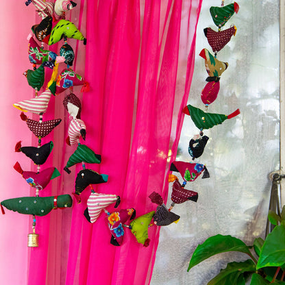 Long String of Birds with Bell