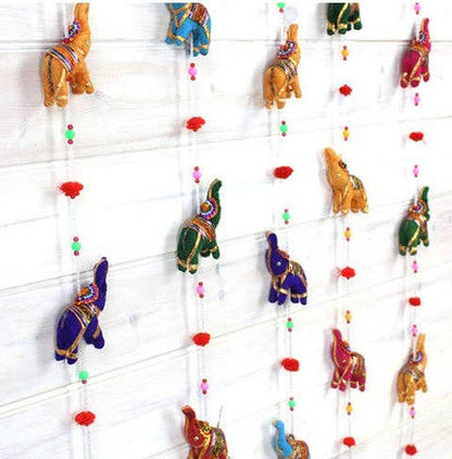 String of Elephants with Bell