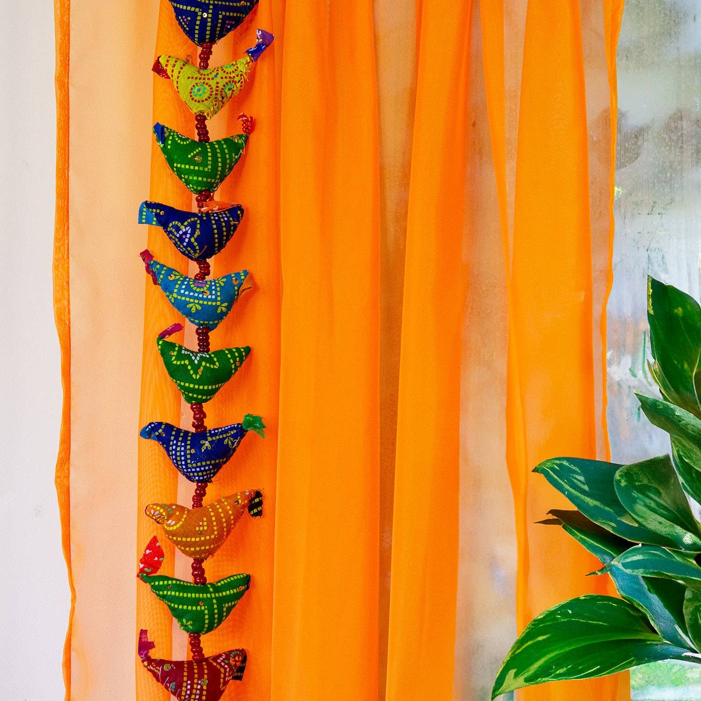 String of Birds with Bell